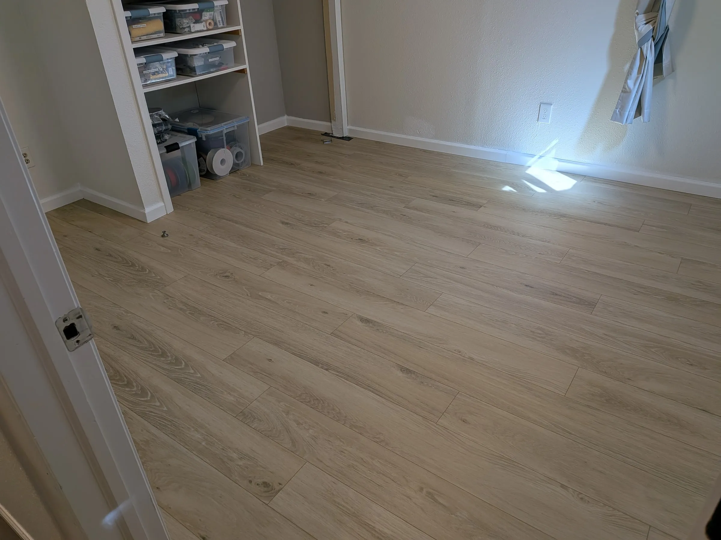 The third bedroom, baseboards in and caulked